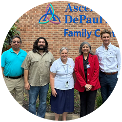 5 people standing in front of Depaul family health center