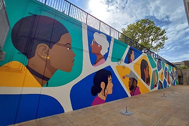 Mural wall painting of faces