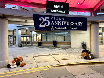 A banner announcing the 2th anniversary of Mercy Hospital hangs in front of Ascension NE Wisconsin - Mercy Hospital