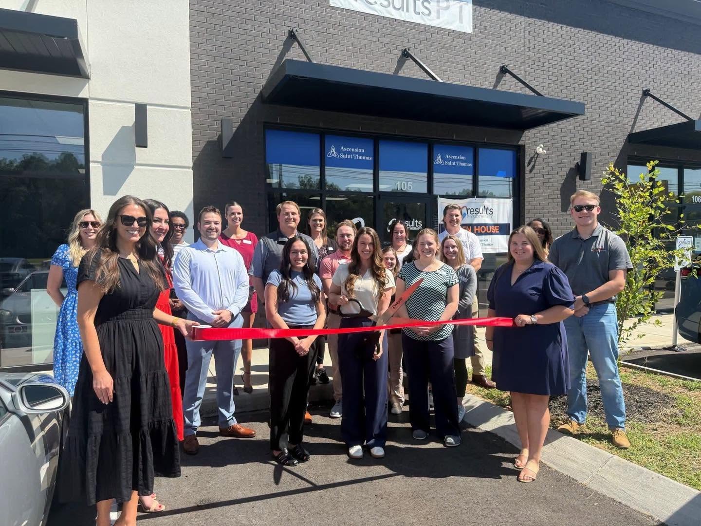 Ribbon cutting celebration for the opening of the Results Physiotherapy clinics
